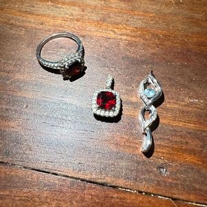 2 necklace charms and one matching ring